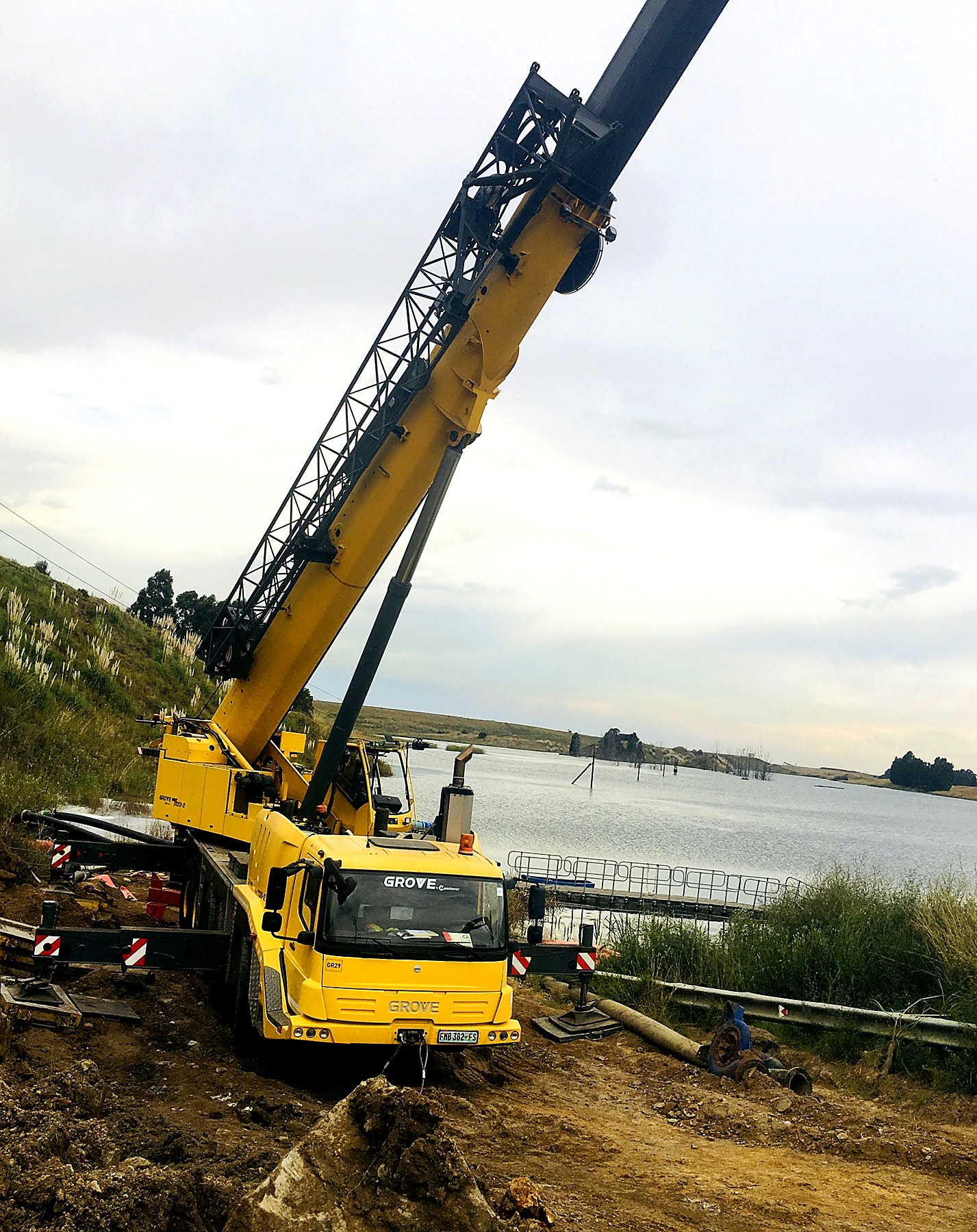 Mobile crane lift in progress on site